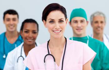 group of healthcare workers smiling group of healthcare workers smiling