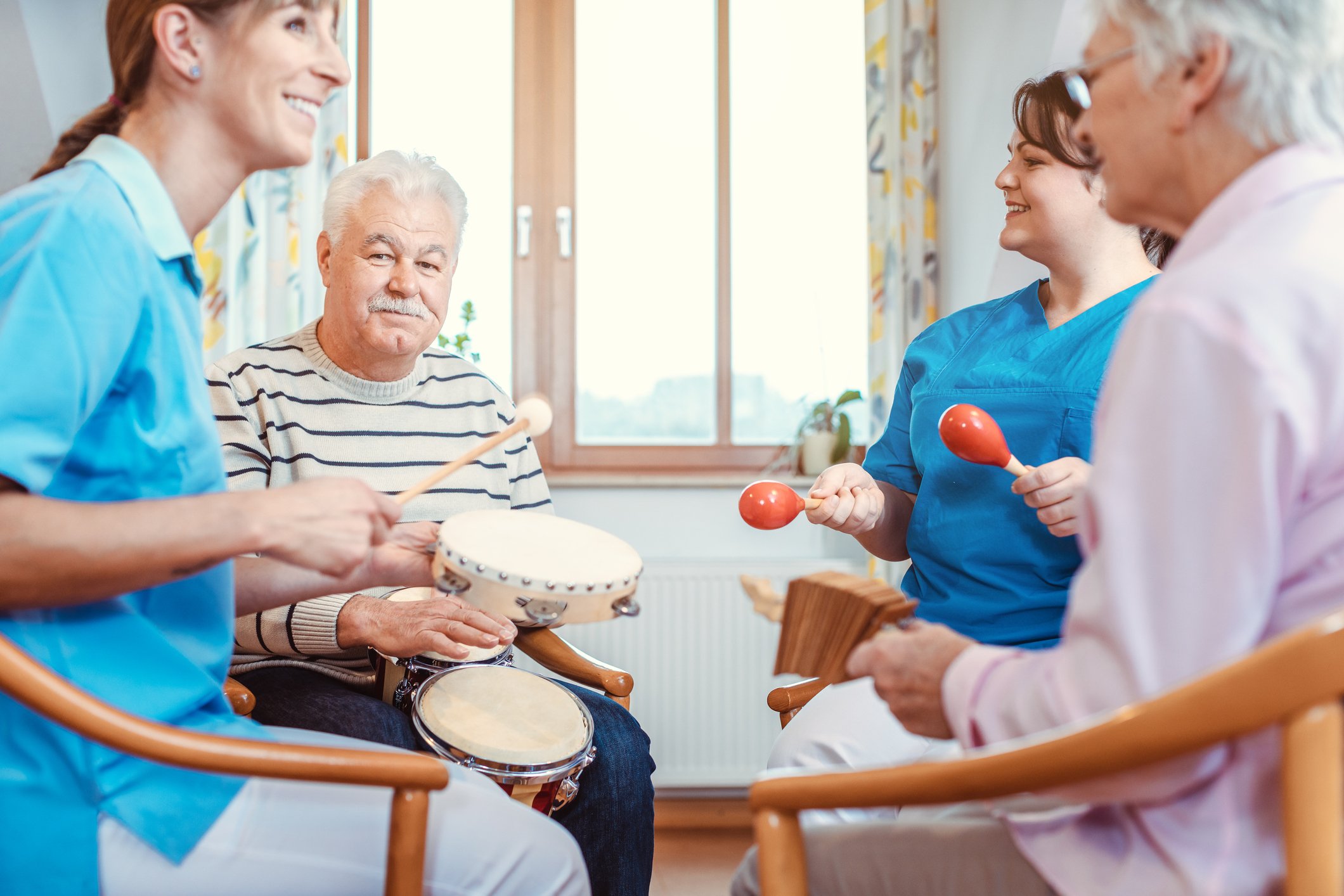 Nurses using music therapy with patients Nurses using music therapy with patients