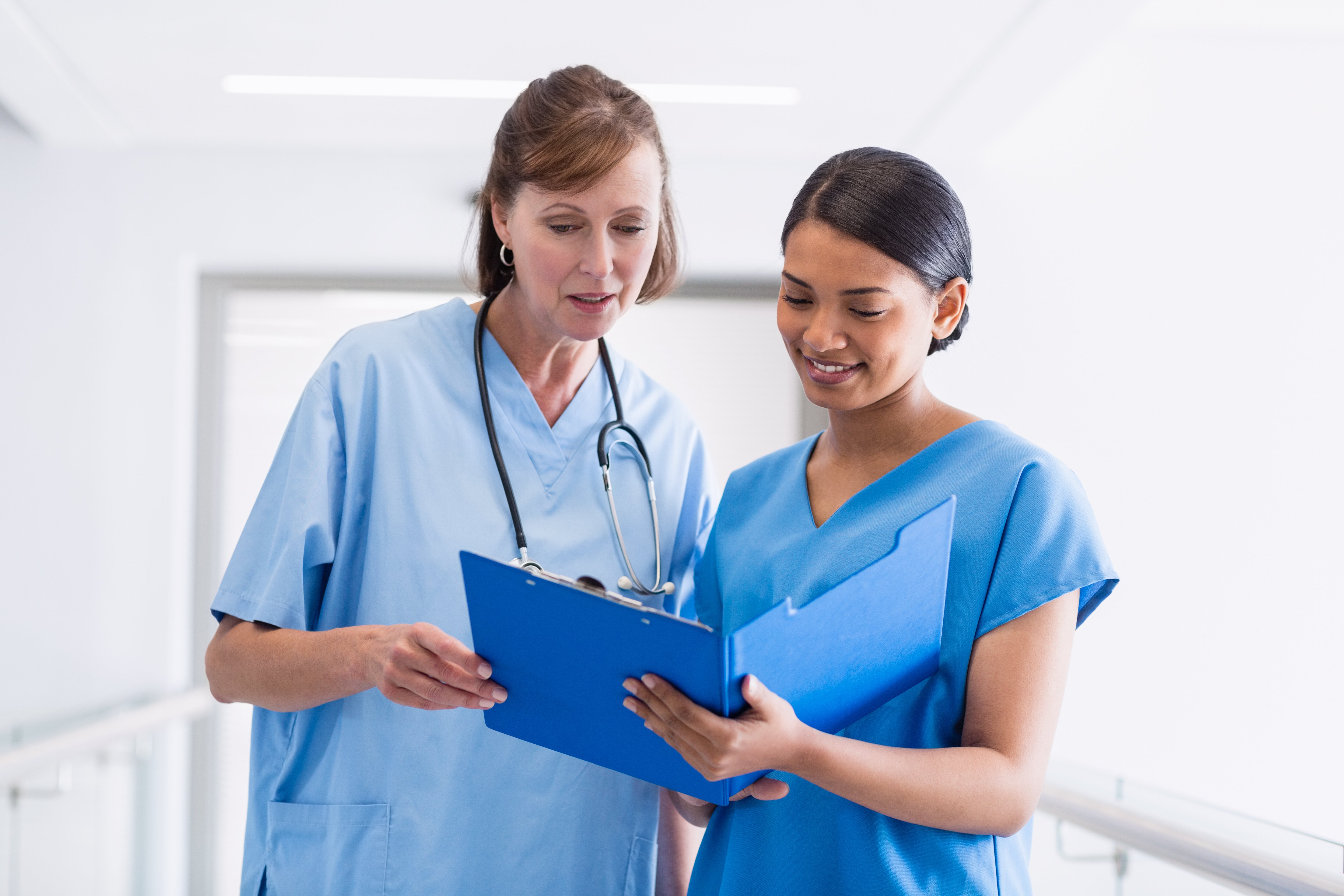 Nurse leader coaching a staff member Nurse leader coaching a staff member