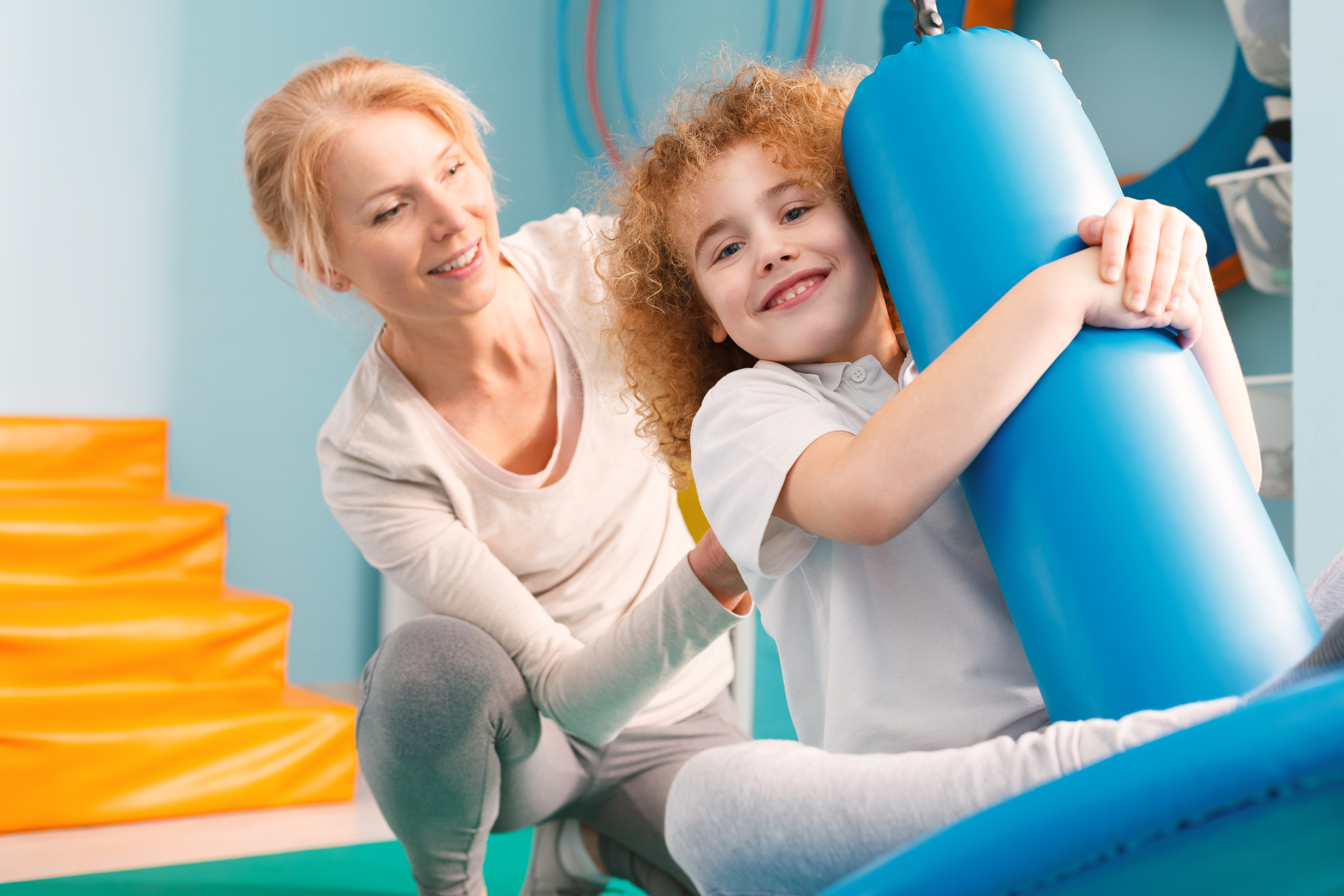 Occupational therapist playing with patient Occupational therapist playing with patient