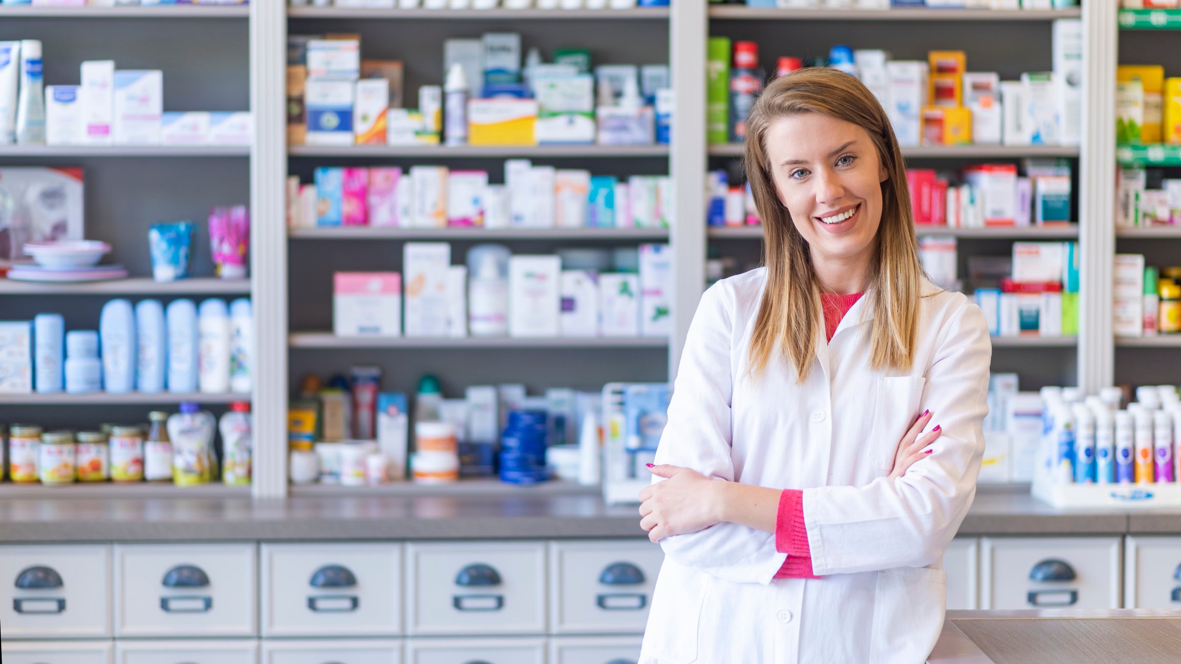 Pharmacy tech smiling in the pharmacy Pharmacy tech smiling in the pharmacy