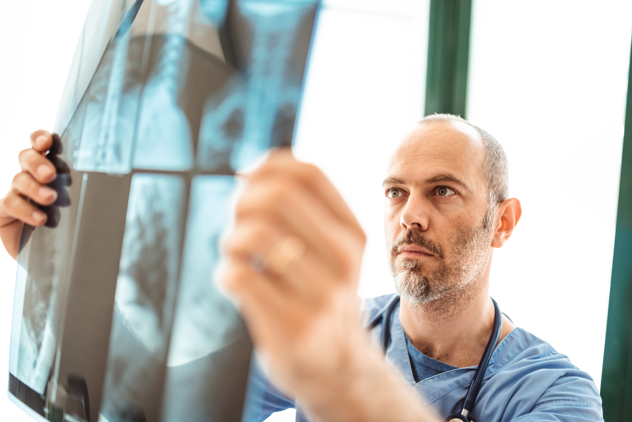 nurse reviewing scans nurse reviewing scans